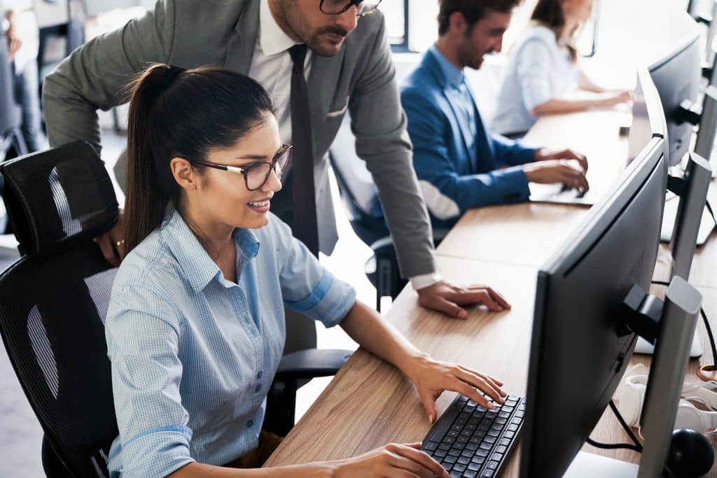 creative people working in office on computer