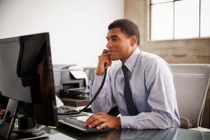 Man using VoIP Router