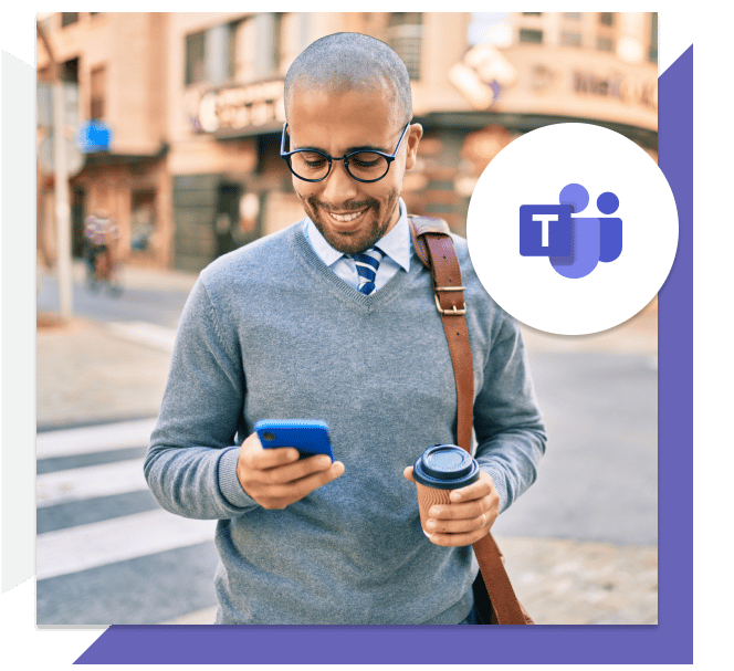 Man smiles at his mobile device that uses G12 Operator Connect for Microsoft Teams